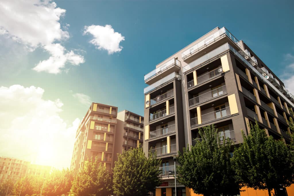 Image of multifamily property with the sun setting